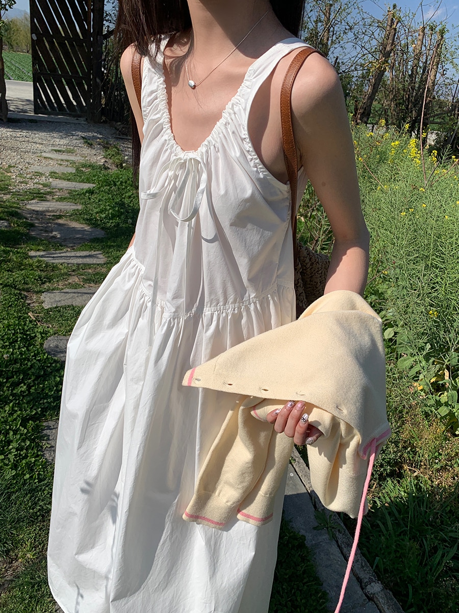 初春ロングスカートバケーション気質ピュアラストスタイルウエスト痩身ノースリーブベストキャミソールワンピースレディース