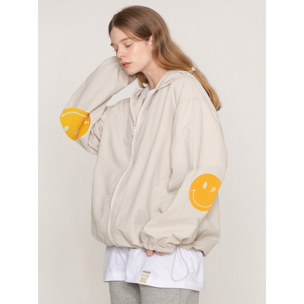 GRAVERエルボドットスマイルウィンドブレーカーアイボリー