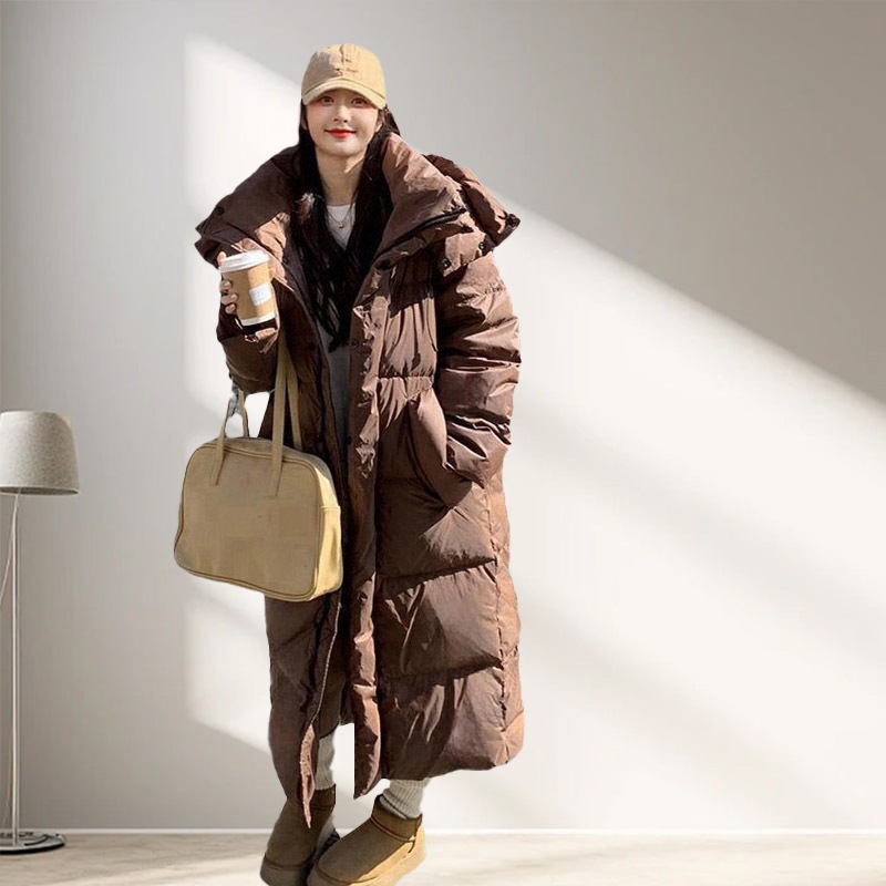 ダウンジャケットの女性の新商品は白鴨の長いタイプの平湖の極寒の中で長いタイプの厚い冬の高級感を厚くします