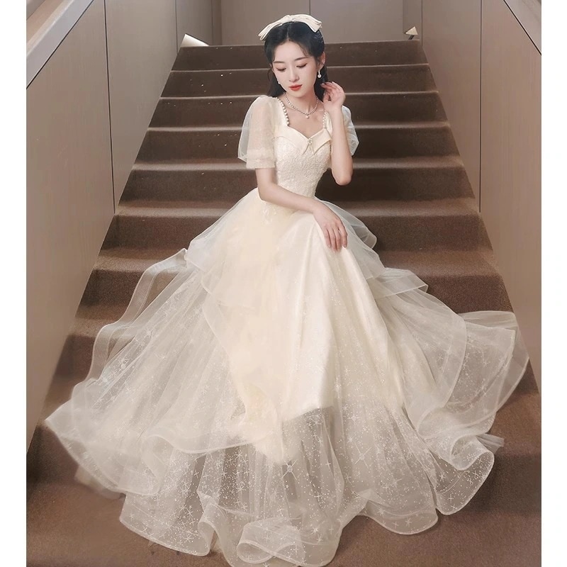 ワンピースドレスドレス女性のためのシャンパンカラードレスハイエンド卒業式ホストアート試験パフォーマンスコスム