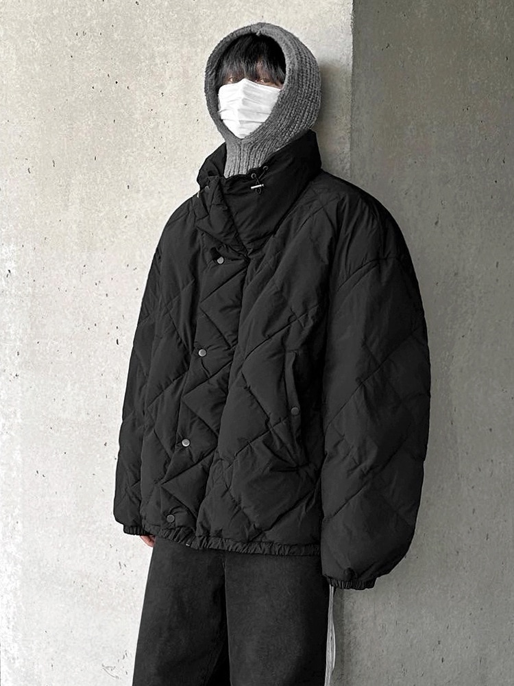 ダイヤモンド格子の襟の綿のジャケットの男性の冬の厚くされたジャケットの韓国の緩いニッチの設計の綿の衣服の年長の感覚