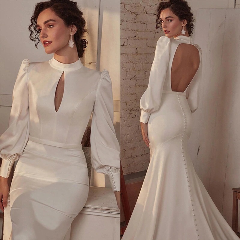 新しいフレンチドレスのスタンドカラーの長袖のセクシーな背中のショーの宴会のドレス 7,850円