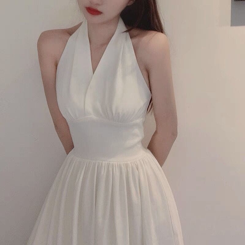 新しい気質の白い首掛けのワンピースの子供の夏