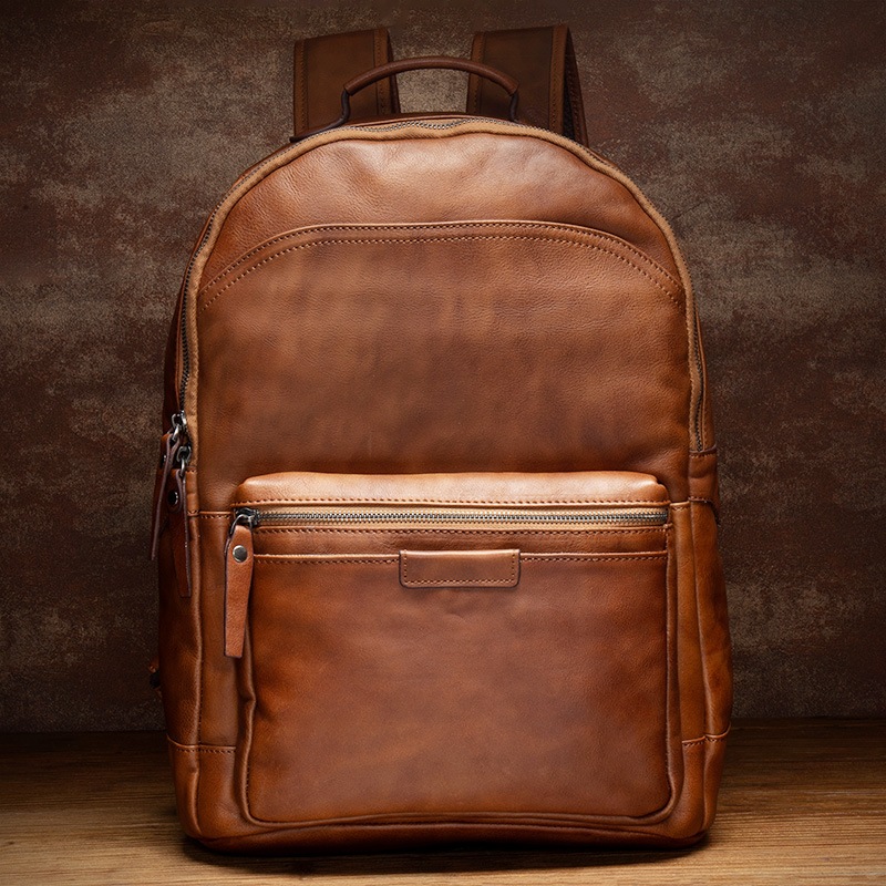 復古復古の手磨き色の真皮リュックサック男性のコンピュータリュックサックカジュアルな頭層植なめし牛革旅行リュックサックです