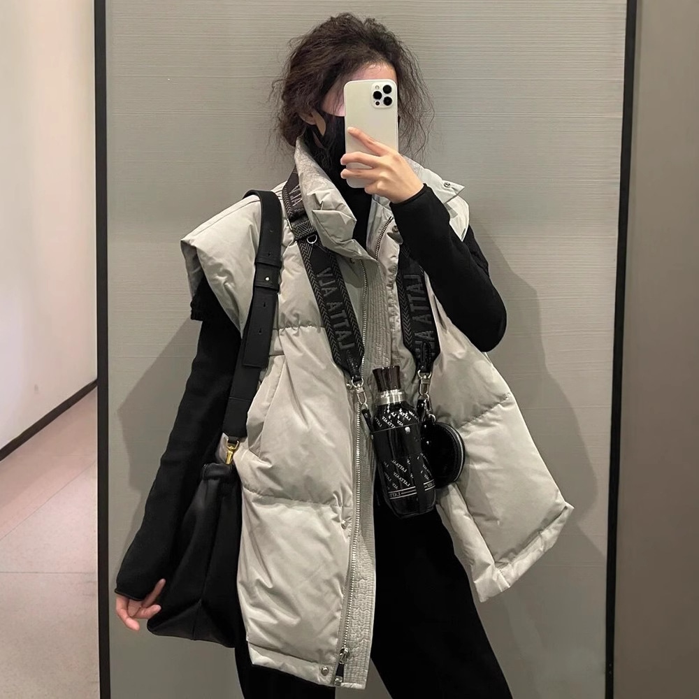 2024 秋冬の女性のための新しいスタイルのダウンベストカレッジスタイルのヨーロッパスタイルのベストインターネット 人のチョッキトップジャケット