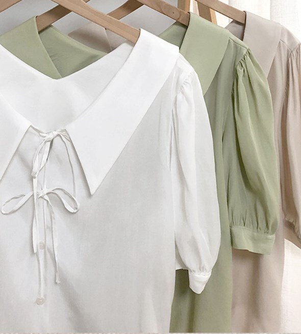 韓国夏エレガントラペルストラップシャツブラウス女性 トップス シャツ 白シャツ ミディアム丈 半袖 バブルスリーブ Vネック 襟付き ドールカラー ストレート リボン 前開き 大人可愛い きれいめ 5,042円
