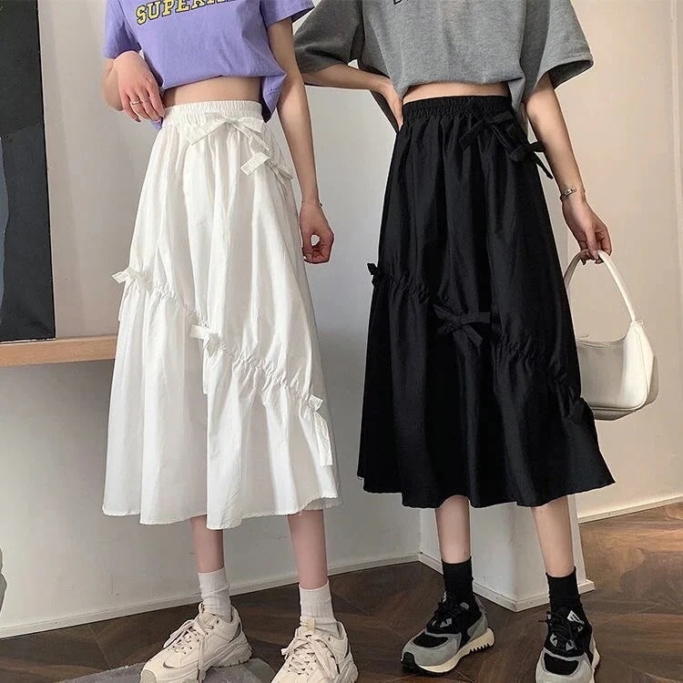 半身のスカートの女性の2025春の新型のフランス式の仙女のスカートの花の高い腰のA字のスカート