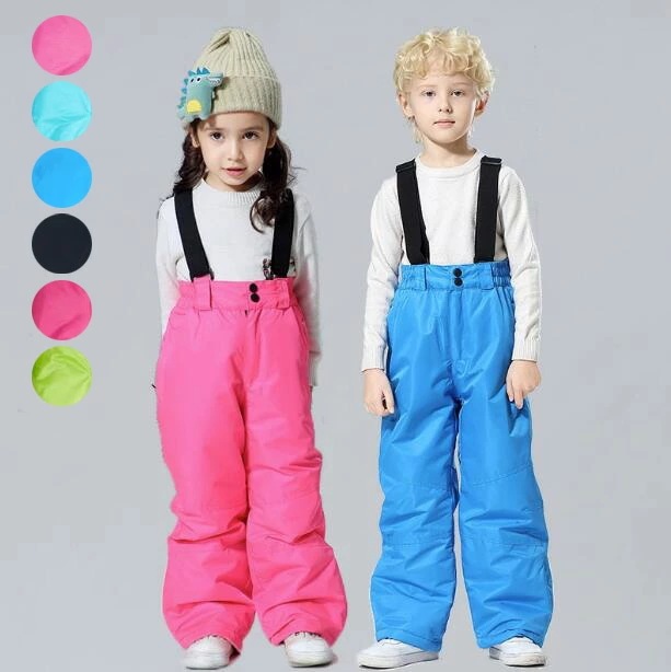 スキーウェア パンツ キッズ ジュニア 男の子 女の子 オーバーパンツ 無地 可愛い サイズ調整 スキーパンツ スノーパンツ ボードウェア スノボ 子供服 冬 小学生 中学生 スキーパンツ サスペンダ