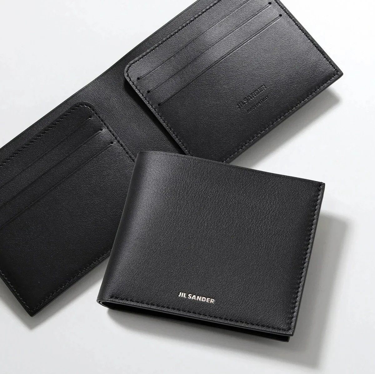 JIL SANDER ジルサンダー 二つ折り財布 J25UI0001 P6489 メンズ 小銭入れなし ミニ財布 レザー 001/BLACK J25UI0001 36,433円