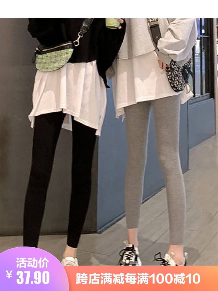 2021公式店舗 純綿の灰色のレギンスの女性は薄い春と秋のねじの縦縞の秋のズボンを着ています 買収