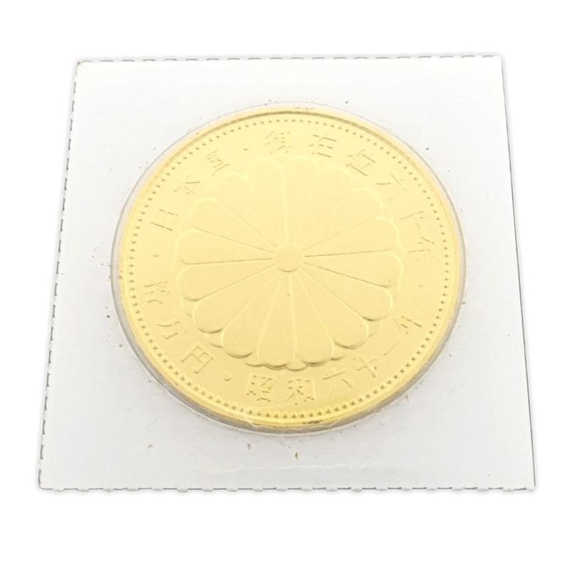 天皇陛下御在位60年記念 10万円金貨 K24YG 拾万円 昭和61年 純金 コイン 20グラム 24金イエローゴールド 金貨 純金/182069【中古】