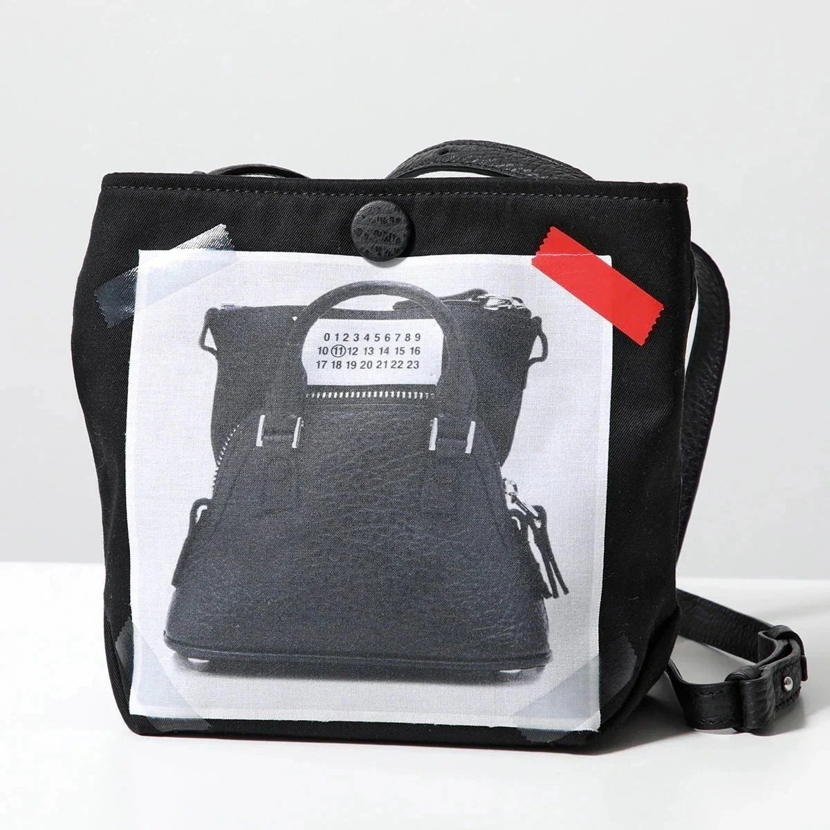 MAISON MARGIELA メゾンマルジェラ 11 ショルダーバッグ TROMPELCEIL 5AC BABY SB1WC0009 P6436 レディース 56,633円