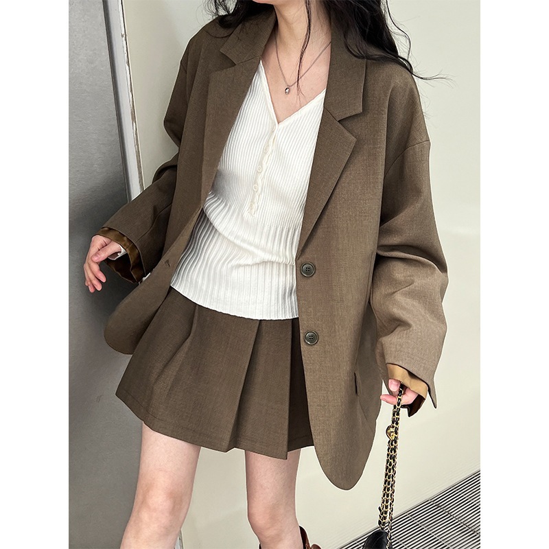 韓国のハイセンスレジャースーツ女性袖口スプライシングブレザー+プリーツ半身スカートセット