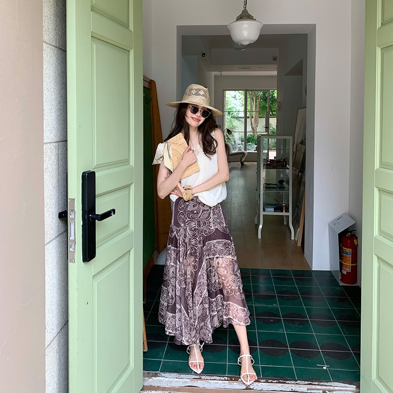 夏の光と通気性のある不規則なレトロプリントスカートの女性のための長いxier自由ho放なスカート