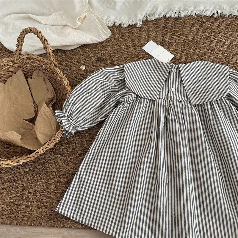 秋の新作韓国子供服ストライプの開襟ワンピース 女の子ポケットスカート