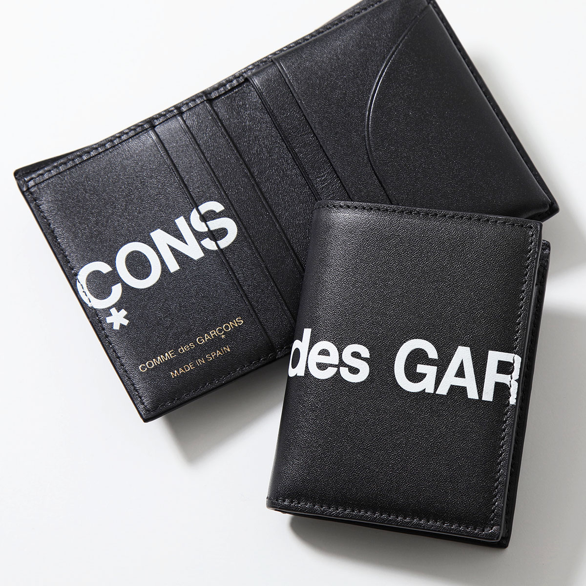 COMME des GARCONS コムデギャルソン 二つ折り財布 HUGE LOGO SA0641HL メンズ レディース レザー 小銭入れなし BLACK 24,980円