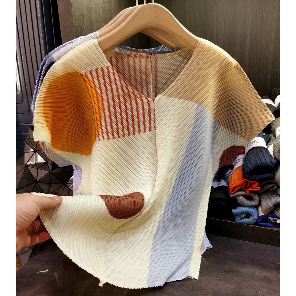 ハイエンドの幾何学はvネックのゆったりとしたしわの上着の気質をつづり合わせて通勤します