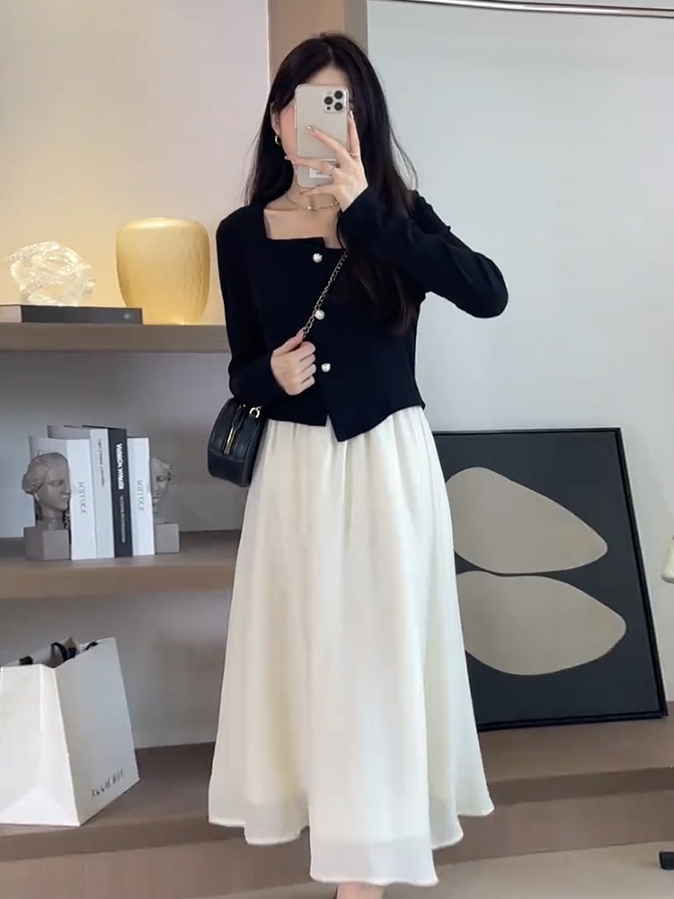 2023年初秋の新しい女性のヘップバーンスタイルブラックドレスサブシニア感覚を着用する小さな気質ロングスカート
