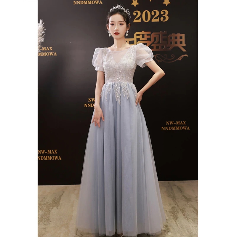 青いタキシードの宴会の雰囲気は軽くて豪華です誕生日パーティーの司会者のワンピースは高級感芸試験のロングタイプです