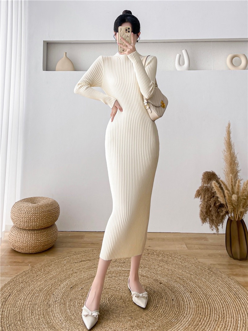 長袖黒ニットワンピース子供秋冬小さな黒いドレスハーフハイネックスリムパッケージヒップジャンパースカートの高度な感覚