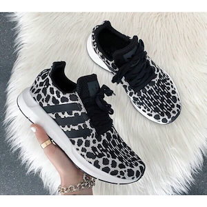 Adidas swift run outlet shoes leopard