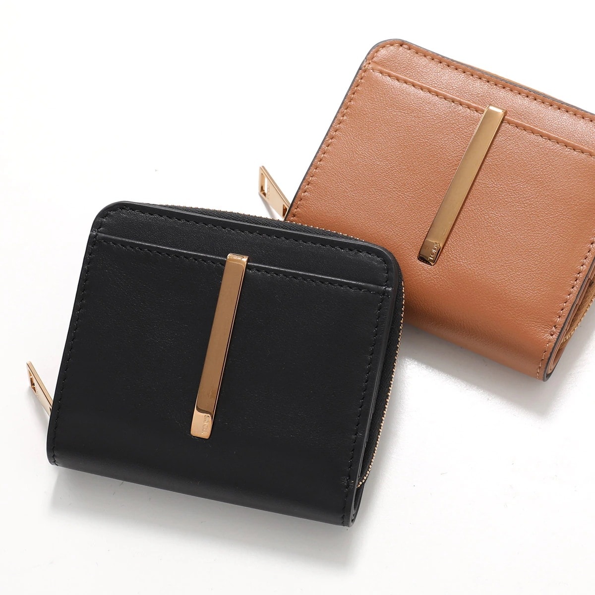 TODS トッズ 二つ折り財布 XAWDBMAI200 UPP レディース レザー ウォレット スモール ミニ財布 豆財布 ロゴ入りメタルバー カラー4色 XAWDBMAI200UPPB999 49,418円