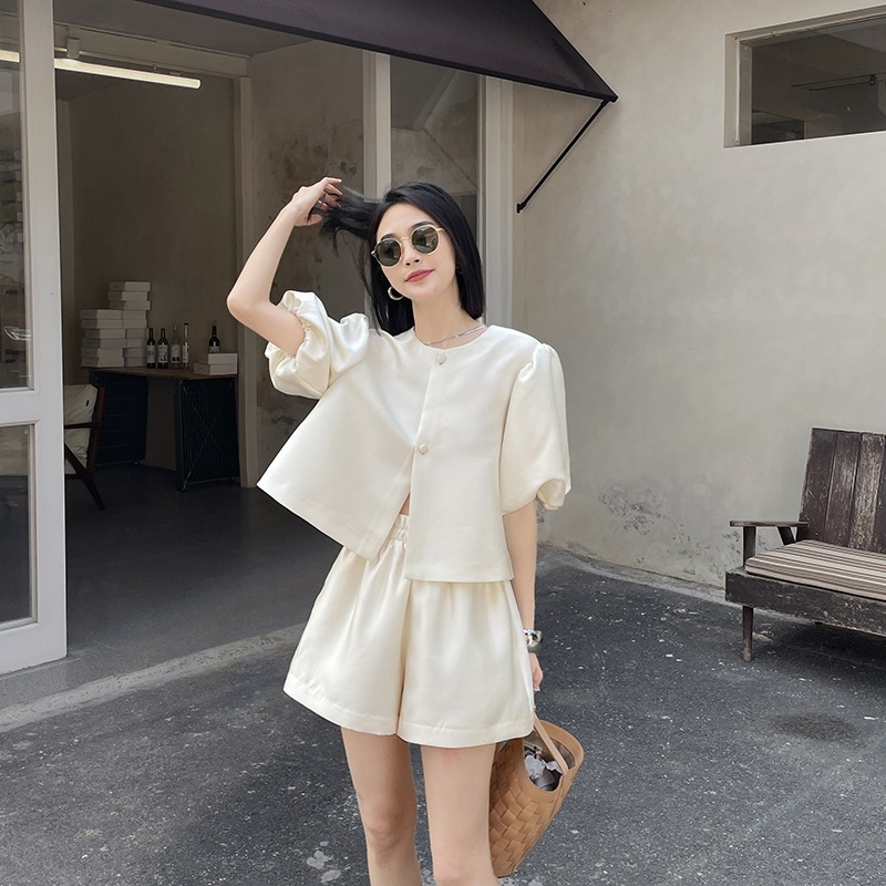 ファーストサーティーンライン 2024 パフスリーブカバードボタン A 裾ルーズスリムラウンドネックシャツ女性用 5,924円