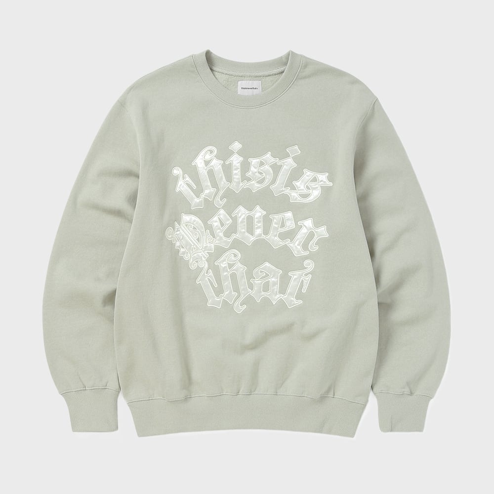 これはネバーザットフォーチュナアップリケクルーネックストーン