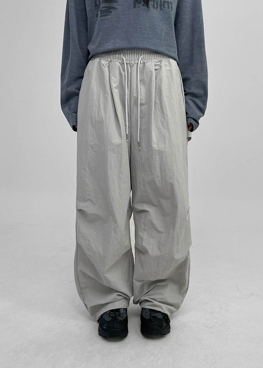 (UNISEX)ノーモアルカーフェンダーナイロンバンディングパンツ