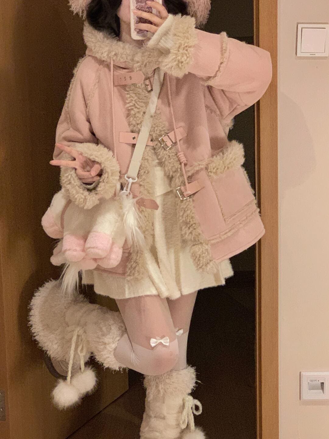 冬の甘くてかわいい学院風少女感減齢つぎ毛の短いコートの雰囲気冬