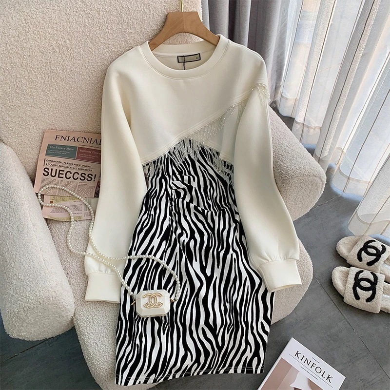 ハイエンドのカスタマイズ-ファッショナブルなスウェットシャツスカートスーツ 2024 春の新作ゼブラ柄甘辛ヒップドレスタッセル長袖トップトレンディ