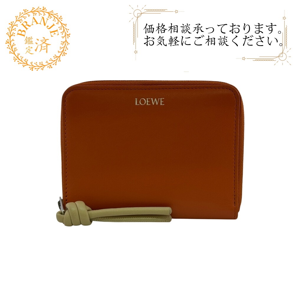 ノット コンパクトジップウォレット レザー 二つ折り財布 オレンジ