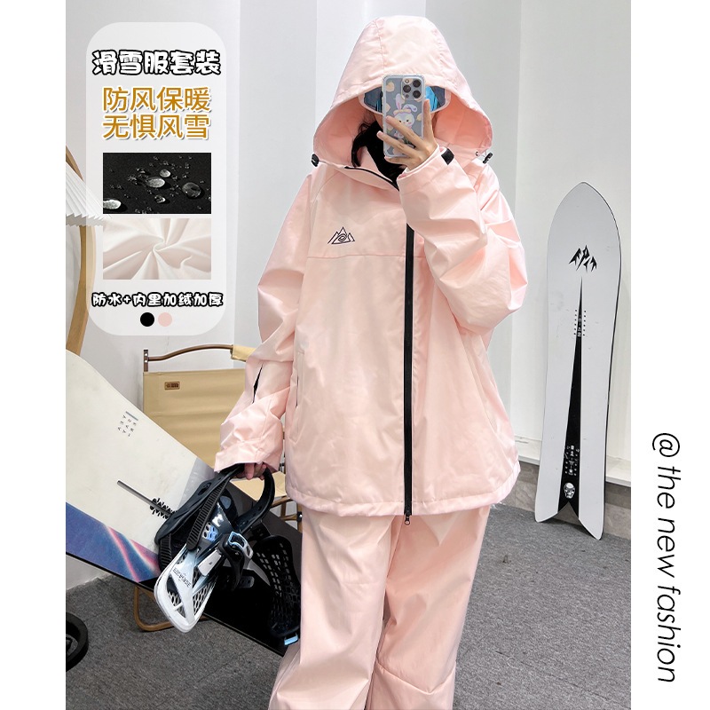 ピンクの連帽防水ファスナーマジック貼り男女カップル用保温スキーウェアセット