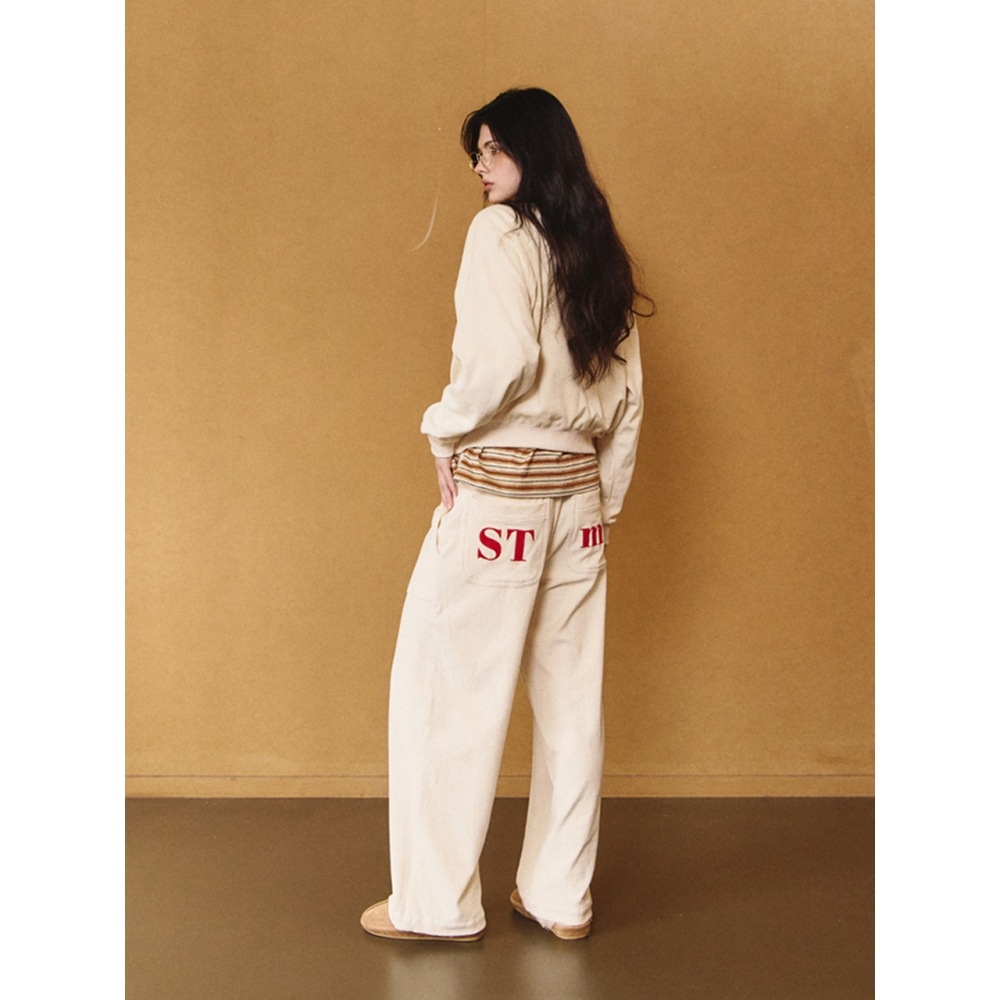 ストライプマーガリン STMG ロゴストライプトレーニングパンツアイボリー