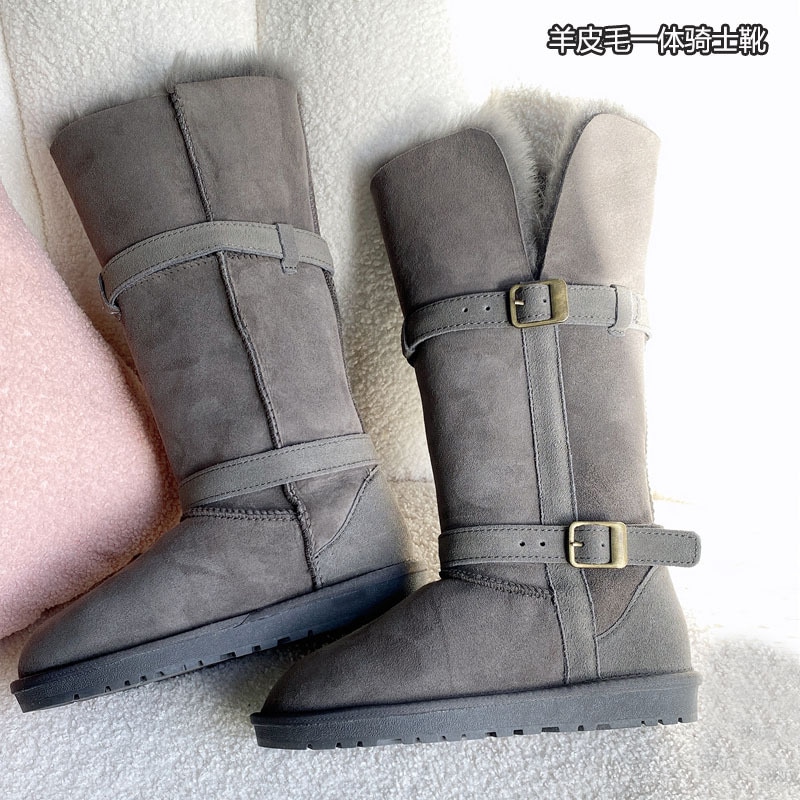 折り返し式の開口部レザーバックルフリースの裏地厚手のコットンシューズシープスキンとウールを一体化したロングブーツを備えた女性用の新しい冬用ハイトップスノーブーツ