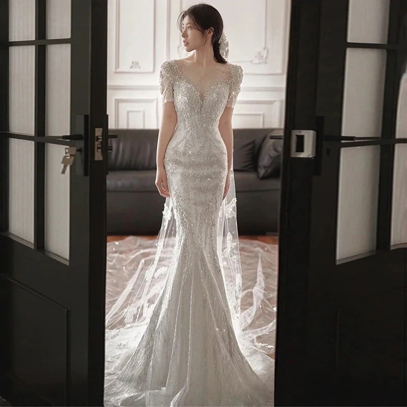 軽いウェディングドレス花嫁2025新しいテールドレス小さな人々が外出するための感ガーゼテール乾杯服