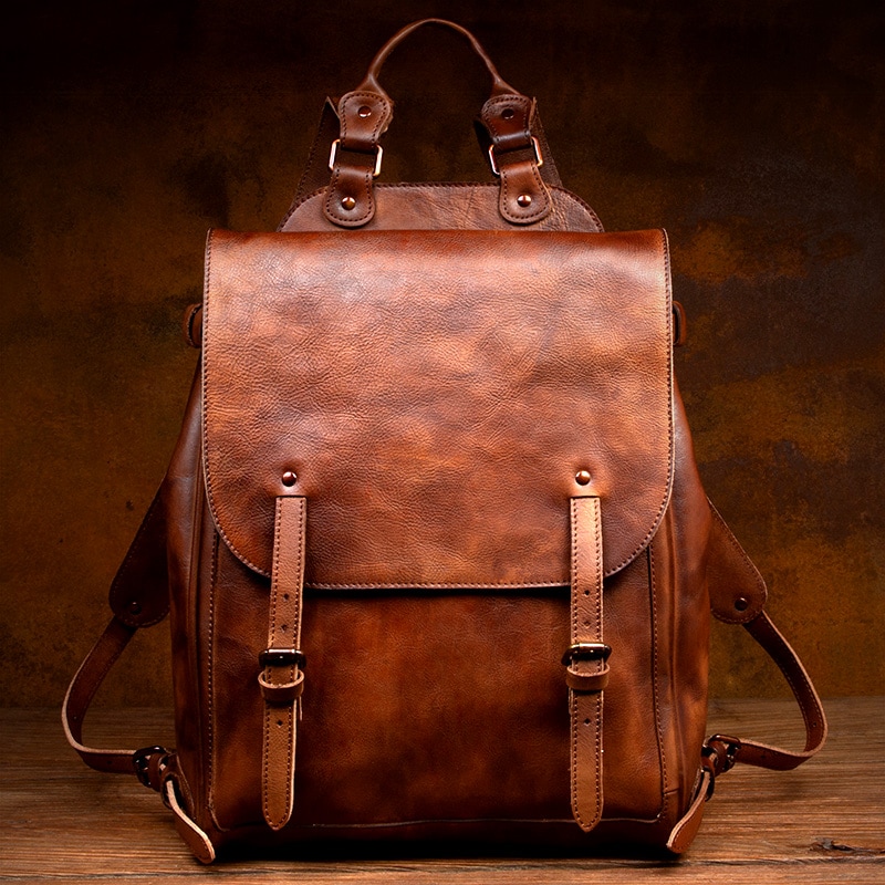 ゆっくりした時間頭層植なめし牛革のランドセル男性の純粋な手で色を拭いて革のリュック女性のコンピュータの皮のランドセル旅行します