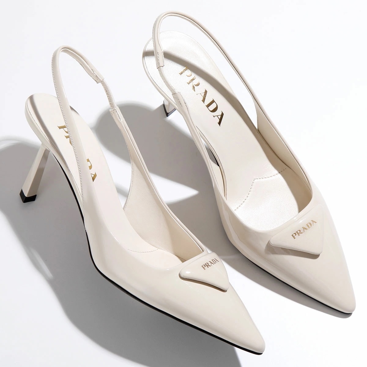 PRADA プラダ ミュール 1I901M JHR A075 レディース パテントレザー スリングバック パンプス ロゴ ポインテッドトゥ 靴 F0304/AVORIO