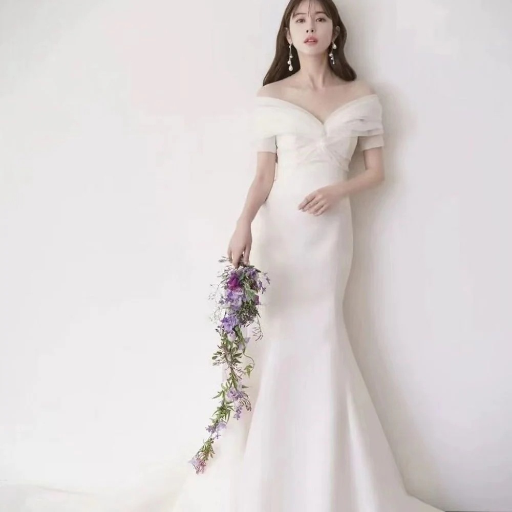 一字の肩のサテンの軽いウェディングドレスの新型の新婦のシンプルな気質の魚の尾のフランス式の森系の迎賓のドレス 7,209円