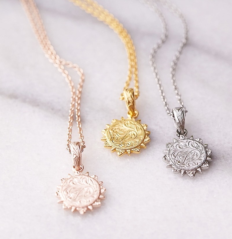 ネックレス サージカルステンレス製 ハワイアンジュエリー 太陽モチーフ スクロール マイレ