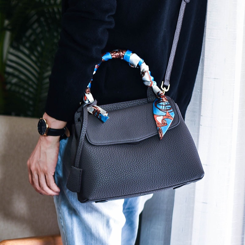 港の風のシンプルな気質の猫の頭を包む牛革の皮の百合の本革の女性のバッグキャリーバッグの肩の斜めなショルダーバッグのハンドバッグです