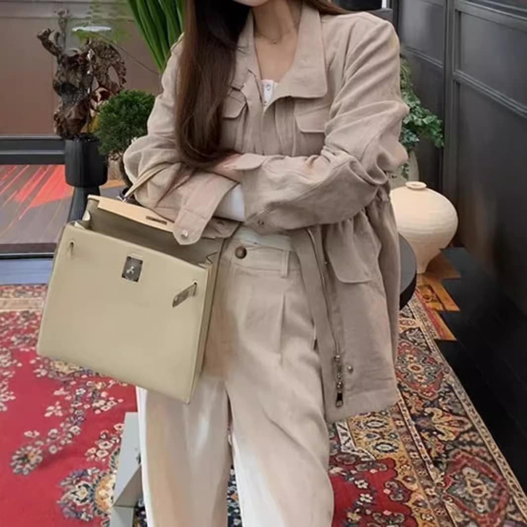 リラックスしたお金の立体ポケットデザインリネンコート女性の早秋腰ひも引きウエストカバー