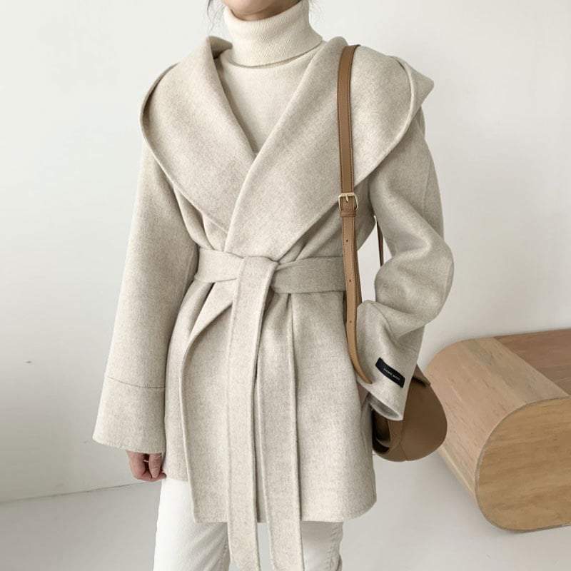 韓国の秋の気質のフード付きポケットデザインウエストを引き締めてスリムにするストラップ付き無地長袖ウールジャケット