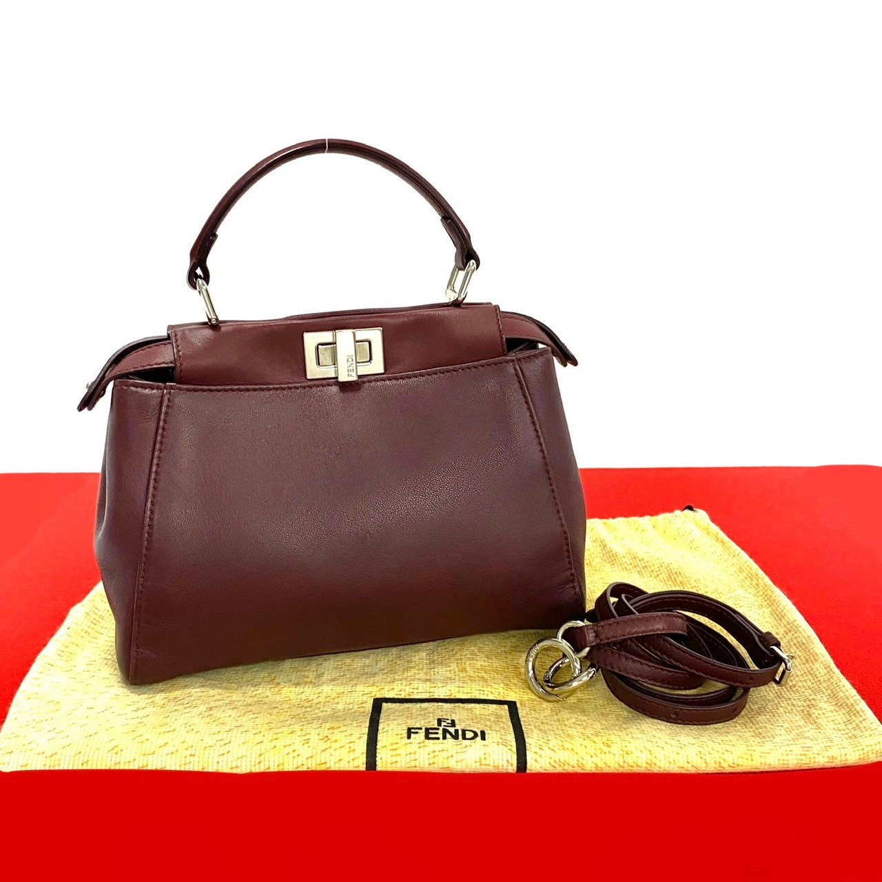 ピーカブー ミニショルダーバッグ レザー ワインレッド 31254 125,900円