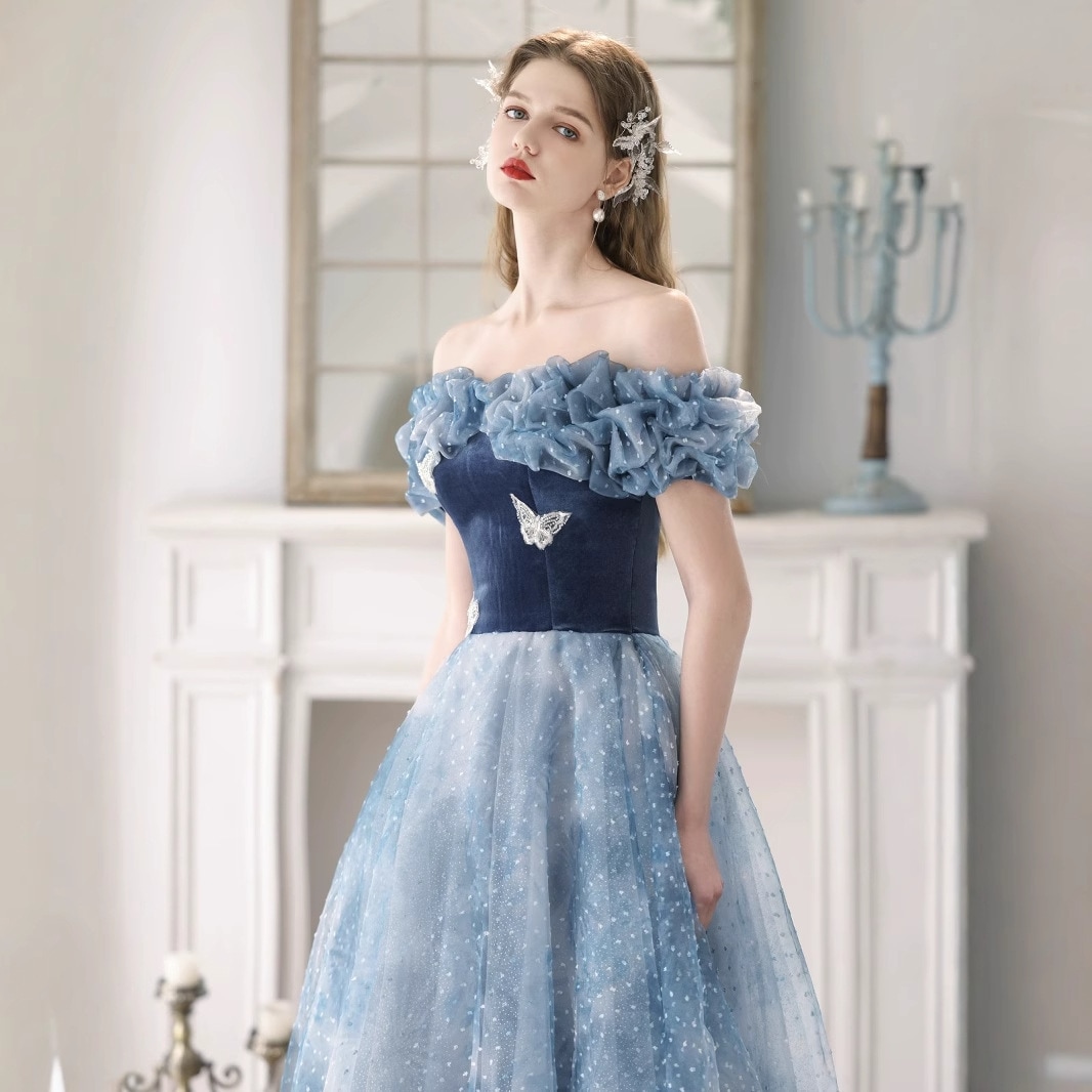 気の誕生日のお姫様のスカートの肩のドレスの女性法の長いワンピースのファッションの宴会の司会のドレス