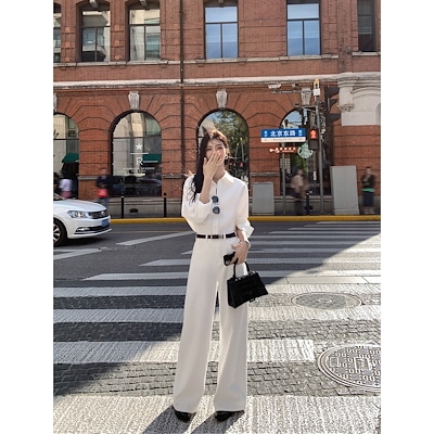 白いルーズなワイドレッグジーンズ女性用ハイウエストパンツ用途の広いモップパンツ