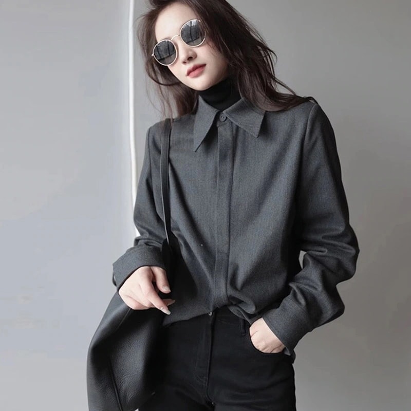 女性用グレーのレイヤードシャツ2025年秋ユニークなデザインフレンチスタイルの高級トップス