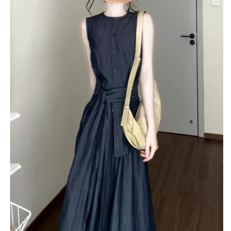 昔ながらの丸首ノースリーブタイアップトップスとゆったりAラインスカートのセット女性の新しい夏のスタイル高級感