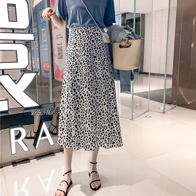 2色 スカート 春 夏 秋 きれいめ フレアスカート ミモレ丈 ミドル丈 レオパード アニマル柄 透け感 ホワイト ブラック かわいい 大人可愛い きれいめ 大人 上品 おしゃれ お洒落 S M L