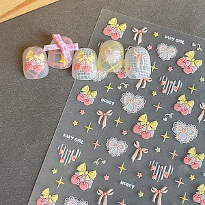 【1点ご購入 で10点プレゼントいたします】エンボスチェリーリボンネイルシール甘いハートの星飾りシール